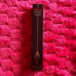 Charlotte Tilbury Highlighter Beauty Wand in Spotlight